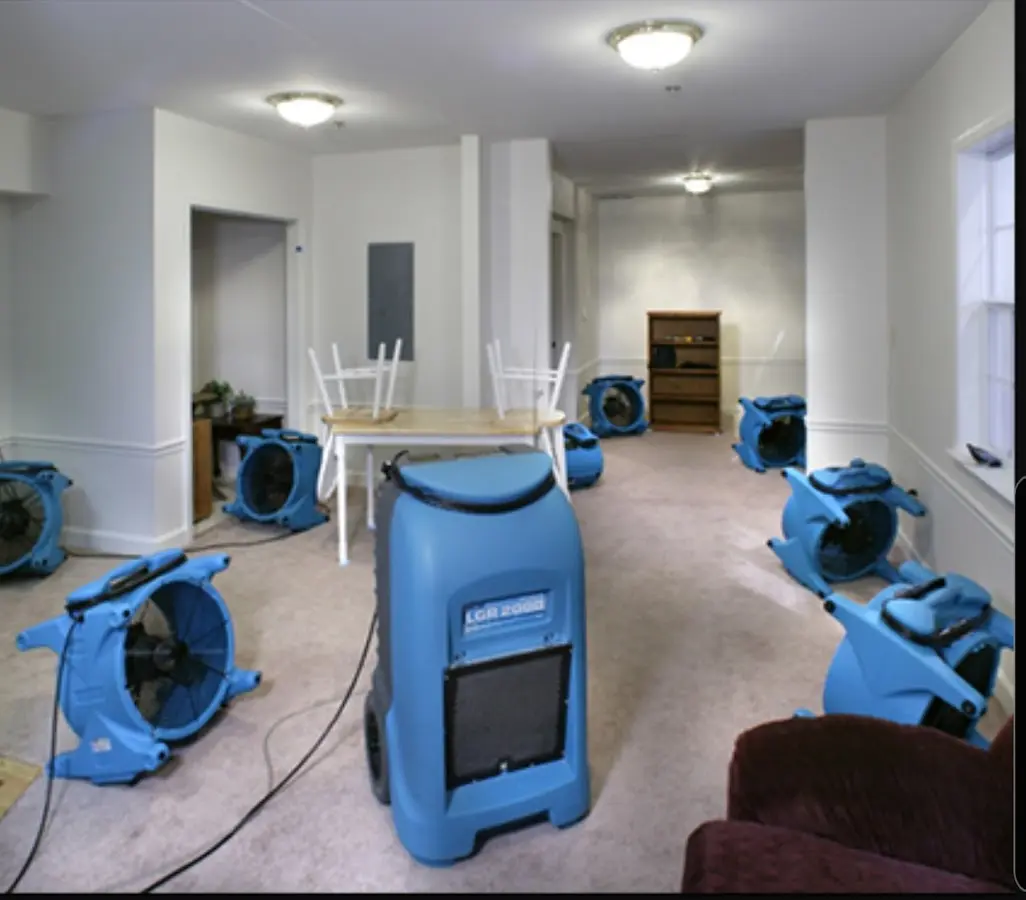 Air movers and dehumidifier setup for Water Extraction & Removal in Norwich